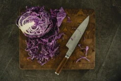 Fiskars Norden Large Cook's Knife -Kitchenware Shop Fiskars Norden Large cooks knife cabbage Hero image 1026419